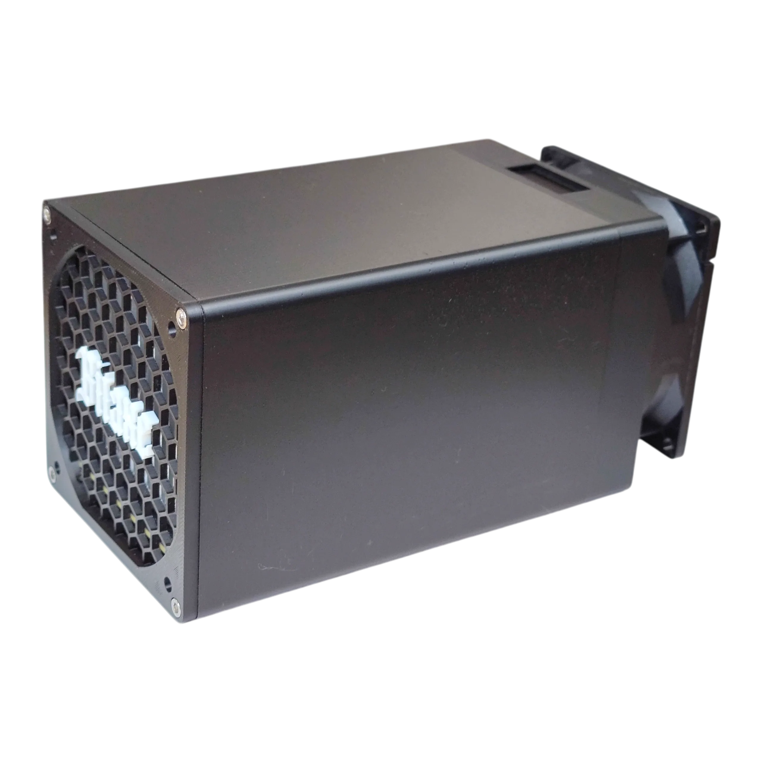 Bitaxe Hex enclosed solo Bitcoin miner, angled view showing honeycomb front grille and rear cooling fan
