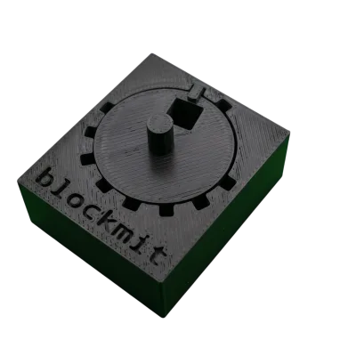 3D printed Blockmit jig used as a guide to stamp a crypto seed phrase onto metal washers.