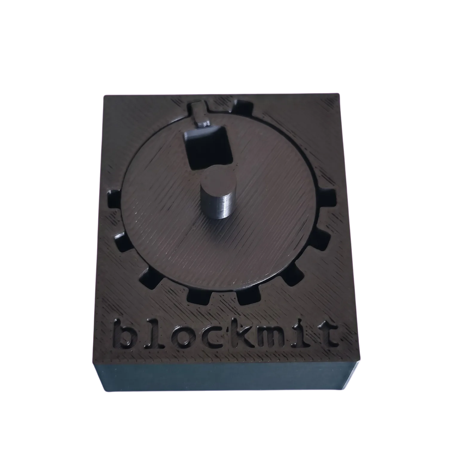 3D printed Blockmit jig used as a guide to stamp a crypto seed phrase onto metal washers.