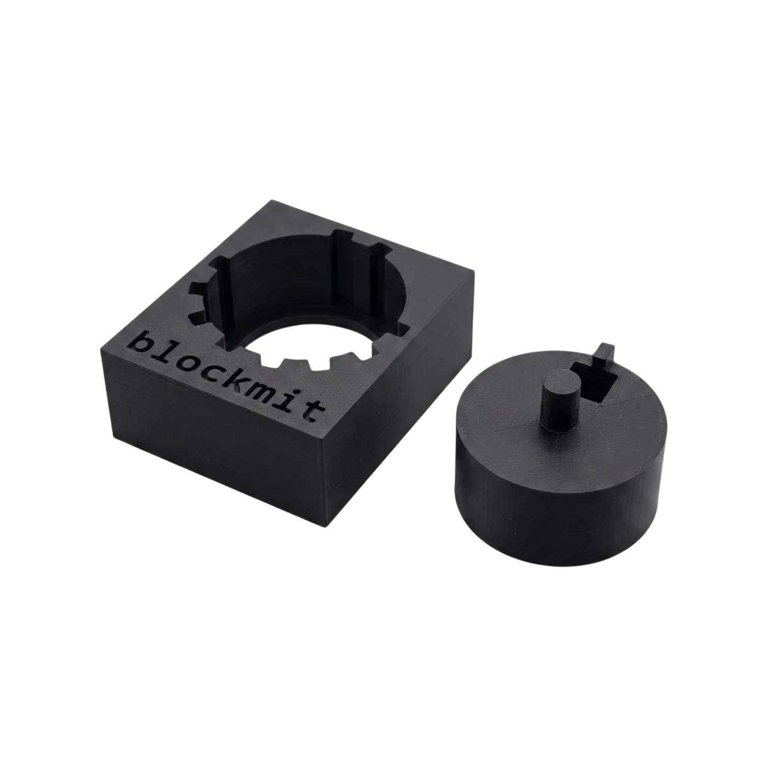 3D printed Blockmit jig used as a guide to stamp a crypto seed phrase onto metal washers.