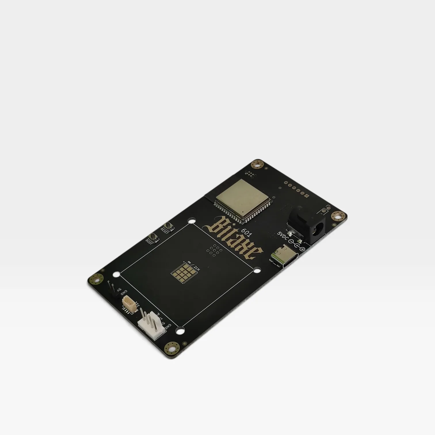 Top view of the pre-assembled Bitaxe Gamma 601 PCB showing the factory-soldered ESP32 microcontroller and the empty central slot for the BM1370 ASIC chip.