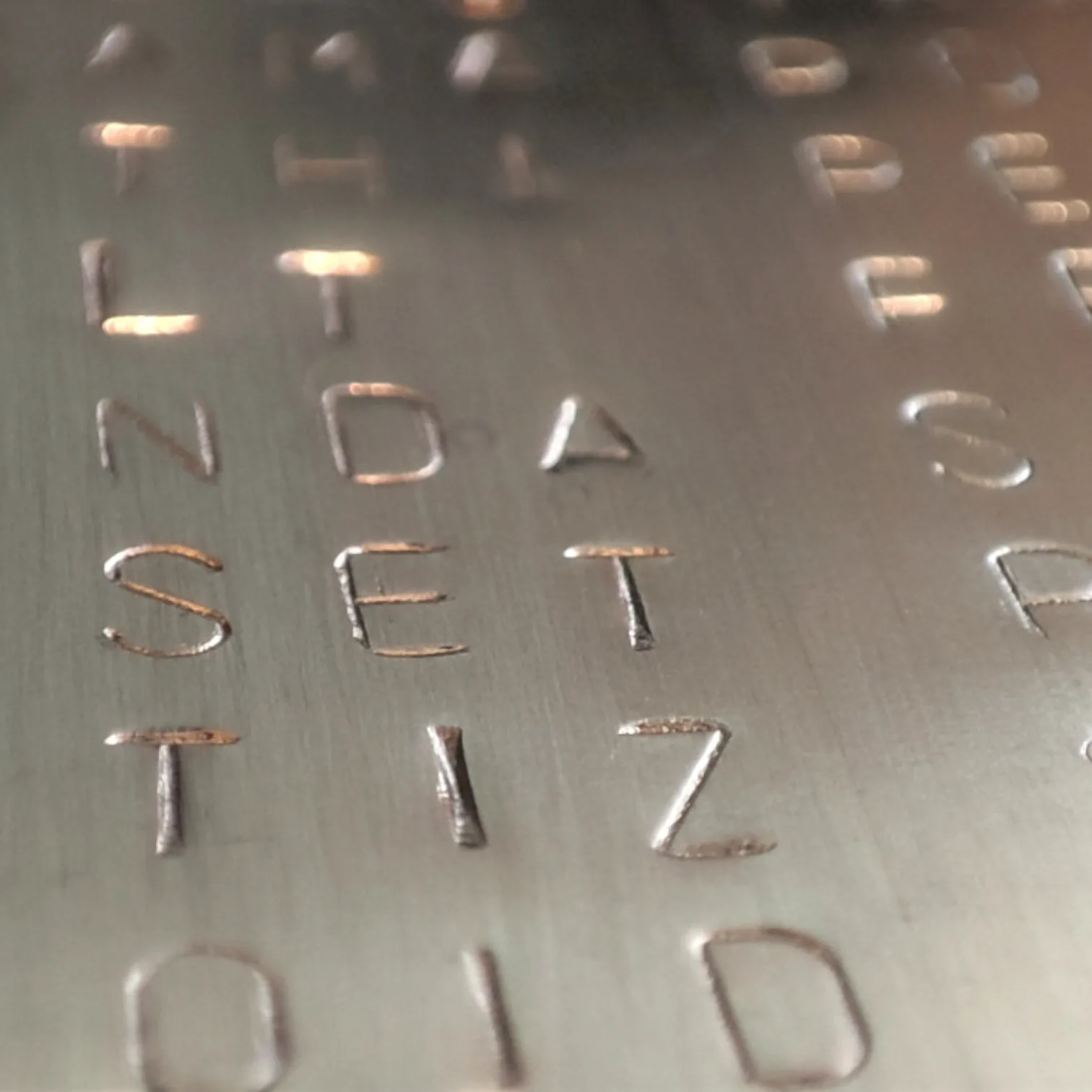 BIP39 metal plate designed for permanent hardware wallet recovery